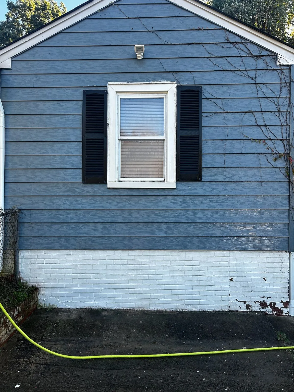 The same house exterior after cleaning