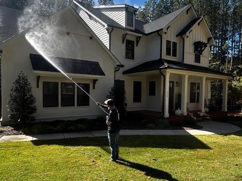 Soft washing a two story home in Iredell County